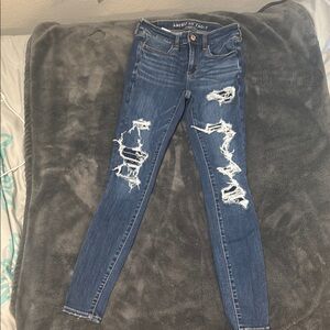 American Eagle Outfitters Blue Skinny Jeans with Edgy Distressing